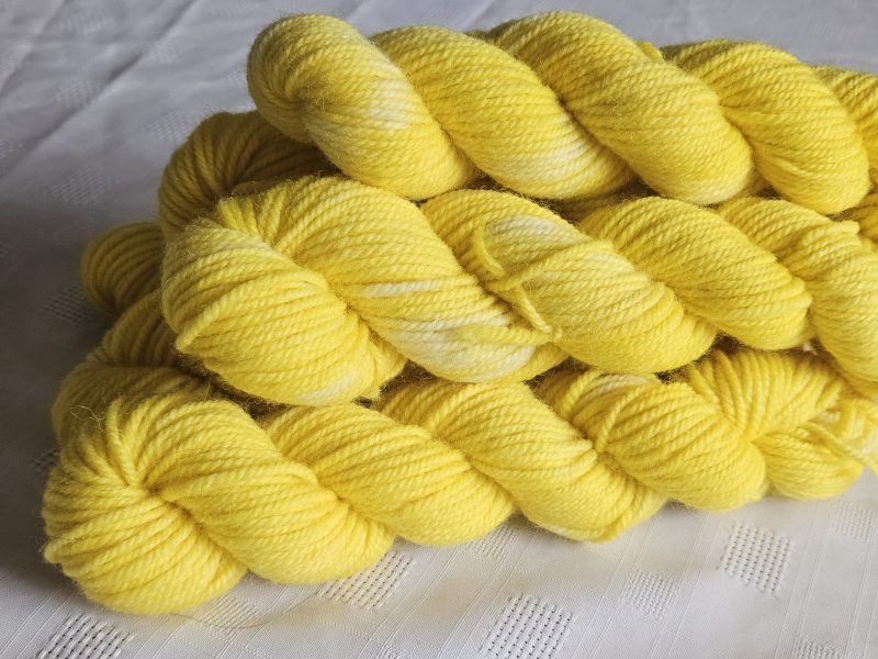 Hand dyed 100% wool yarn.