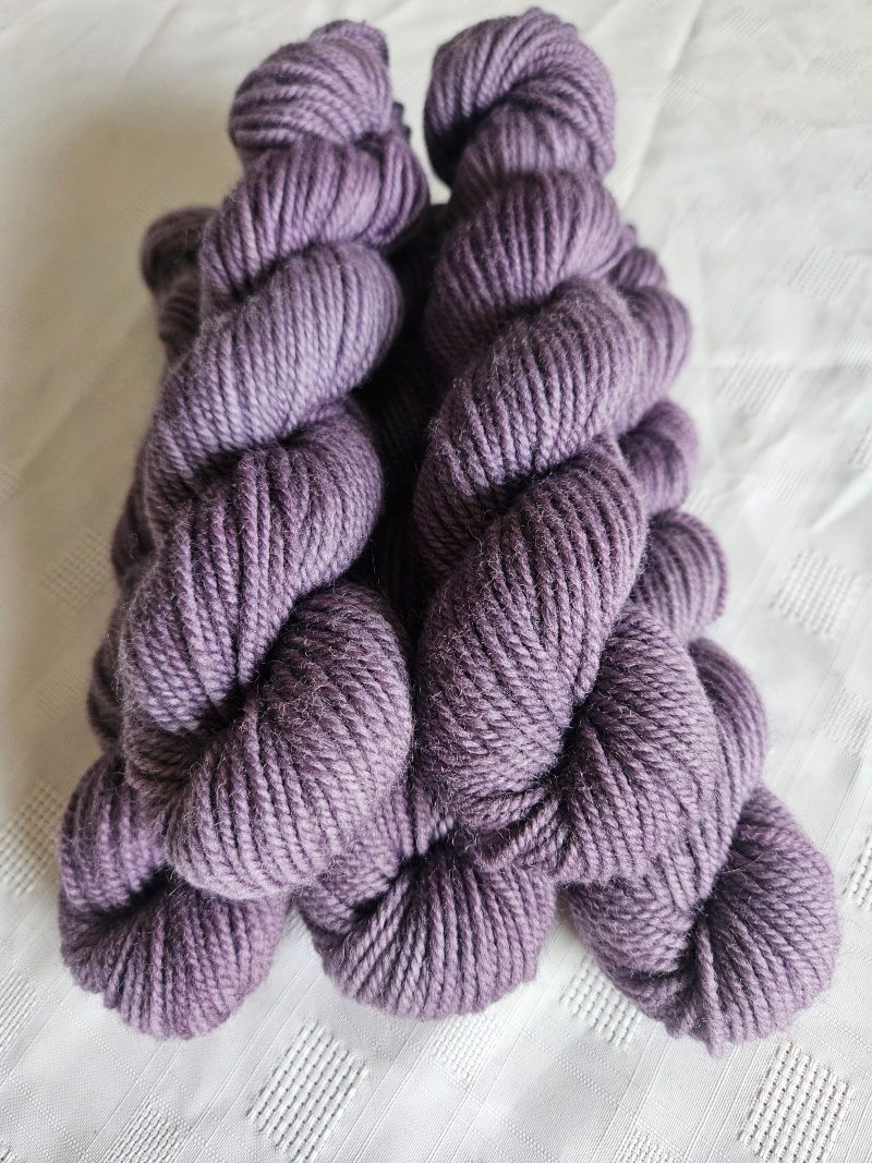 Hand dyed 100% wool yarn.