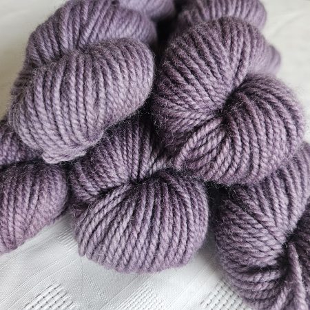 Hand dyed 100% wool yarn.