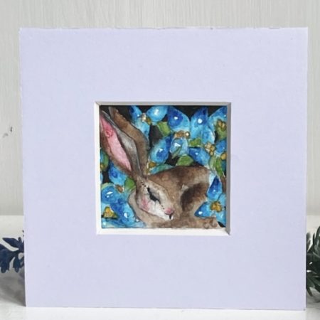 ACEO Mounted Original Resting Hare / Rabbit surrounded by Blue Flowers Watercolour