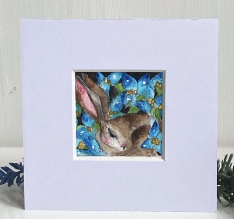 ACEO Mounted Original Resting Hare / Rabbit surrounded by Blue Flowers Watercolour