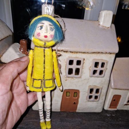 Handmade ceramic coraline doll with moving arms