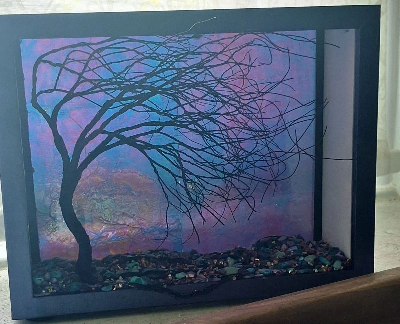 Magical Storm Colour Shifting Suncatcher with silhouette wire tree