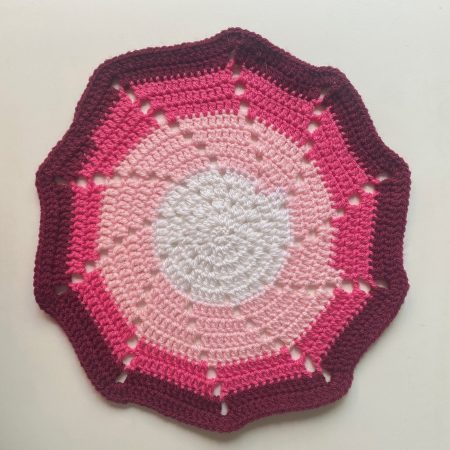 Crochet mats in different colours, sizes and designs