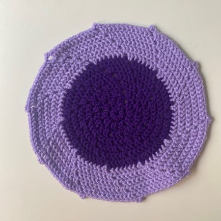Crochet mats in different colours, sizes and designs