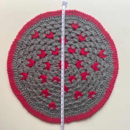 Crochet mats in different colours, sizes and designs