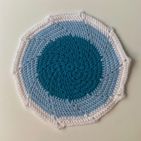 Crochet mats in different colours, sizes and designs