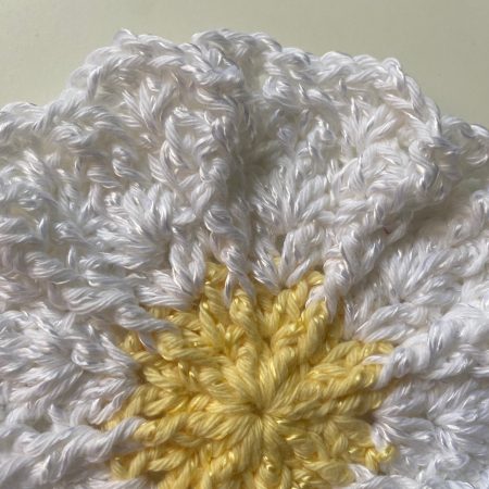 Crochet mats in different colours, sizes and designs