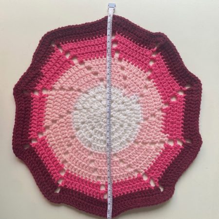 Crochet mats in different colours, sizes and designs