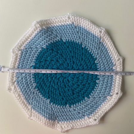 Crochet mats in different colours, sizes and designs