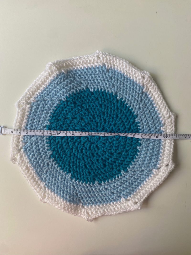 Crochet mats in different colours, sizes and designs