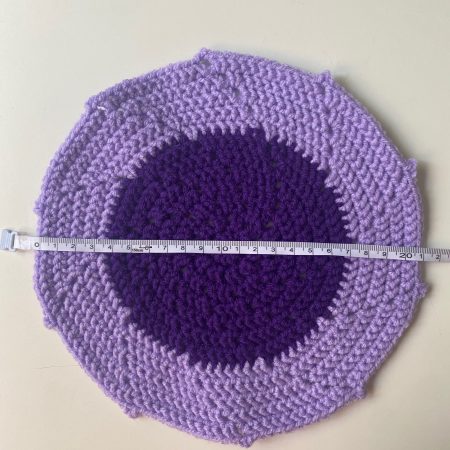 Crochet mats in different colours, sizes and designs