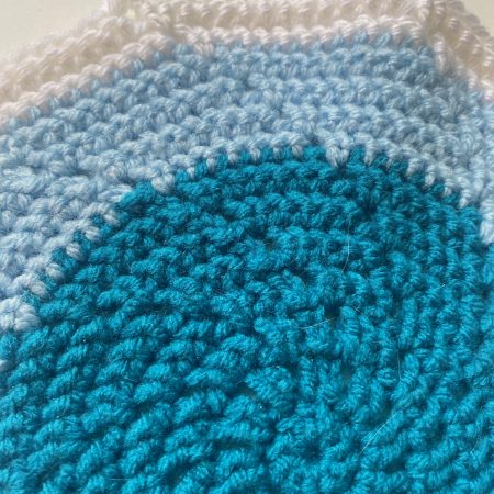 Crochet mats in different colours, sizes and designs