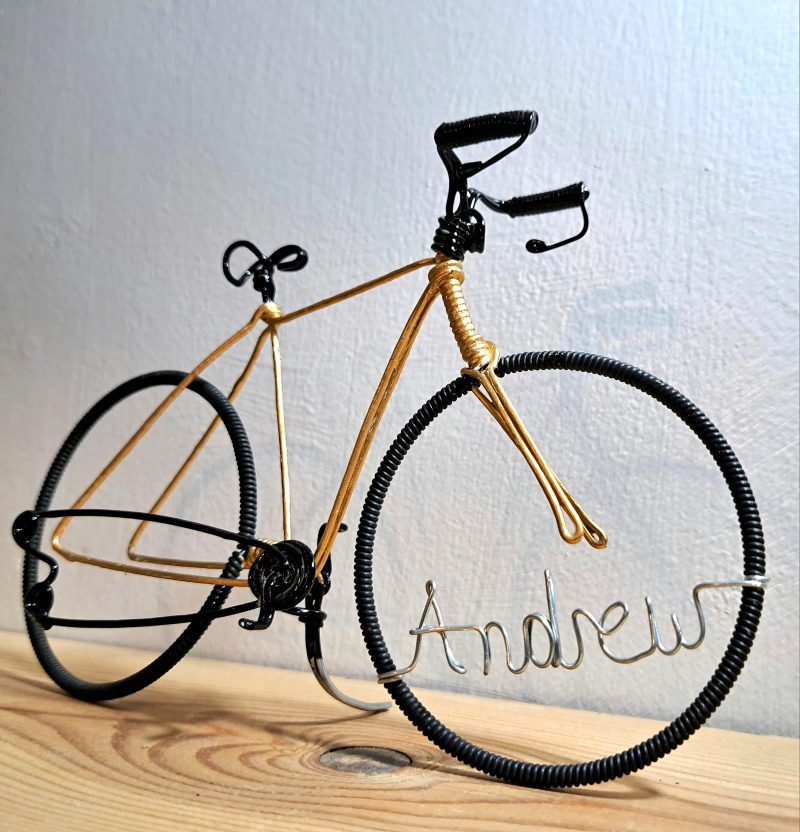 Gift for cyclists personalised bike keepsake and cake topper.