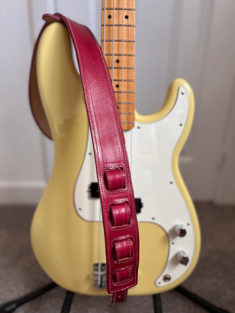 Handmade leather guitar and bass straps made in Mexico. Available in black, blue and burgundy.