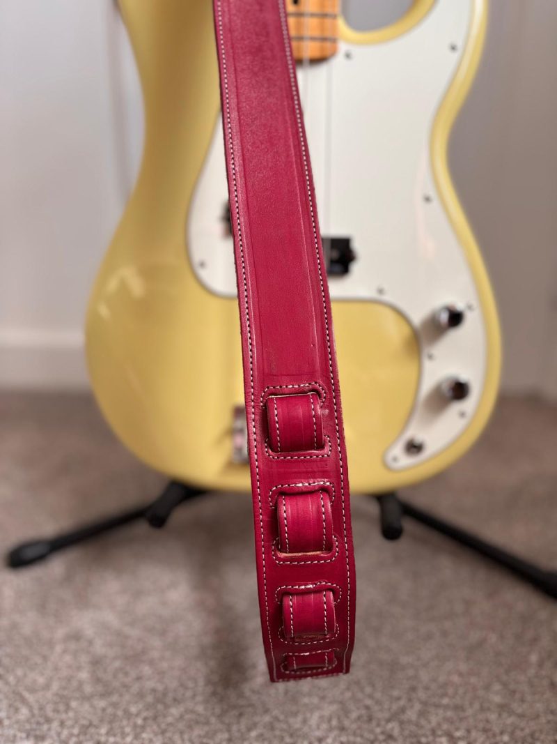 Handmade leather guitar and bass straps made in Mexico. Available in black, blue and burgundy.