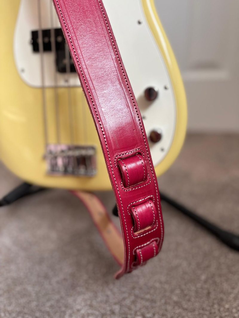 Handmade leather guitar and bass straps made in Mexico. Available in black, blue and burgundy.