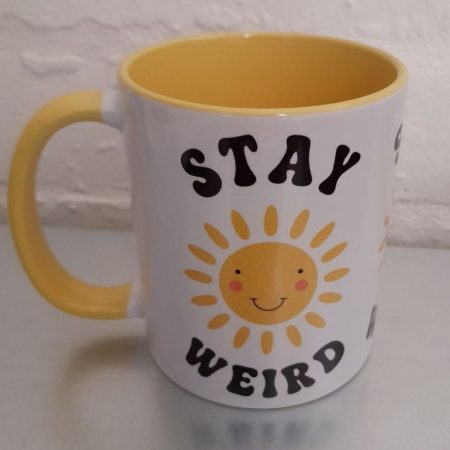 Stay Weird mug with smiling sun - brighten your day!