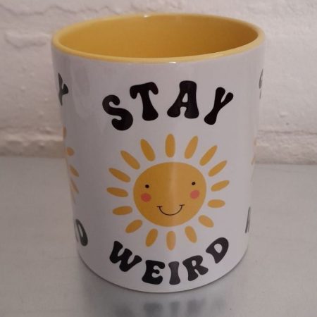 Stay Weird mug with smiling sun - brighten your day!