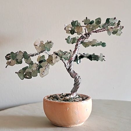 Semi precious green adventurine stone tree sculpture. Stands in a pot decorated with stones.