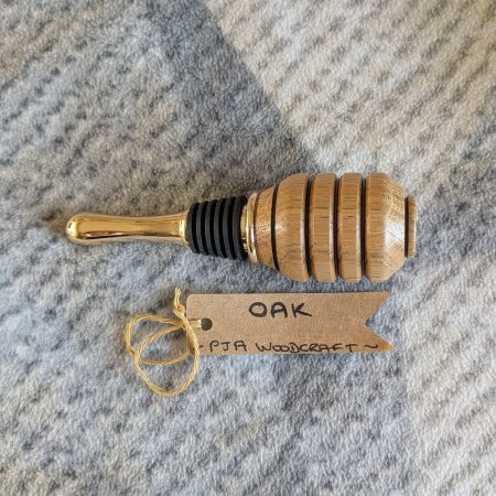 Hand turned bottle stopper made from oak wood