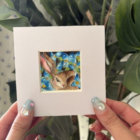 Mounted Original ACEO Resting hare rabbit with blue flowers watercolour