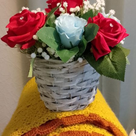 Artificial Flowers set in wicker basket