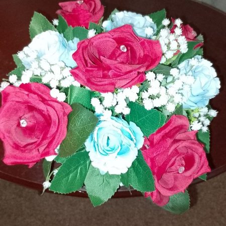 Artificial Flowers set in wicker basket