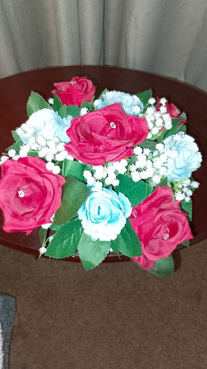 Artificial Flowers set in wicker basket