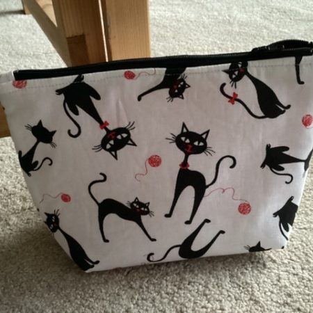 Medium Size Make Up Bag/Pouch Lined Zipped featuring Quirky Black Cat on a White Background