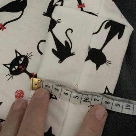 Medium Size Make Up Bag/Pouch Lined Zipped featuring Quirky Black Cat on a White Background