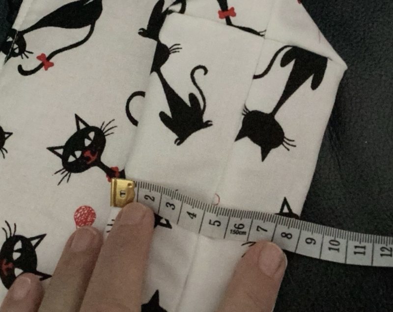 Medium Size Make Up Bag/Pouch Lined Zipped featuring Quirky Black Cat on a White Background