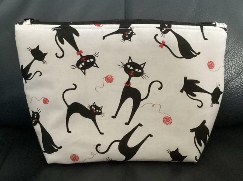 Medium Size Make Up Bag/Pouch Lined Zipped featuring Quirky Black Cat on a White Background