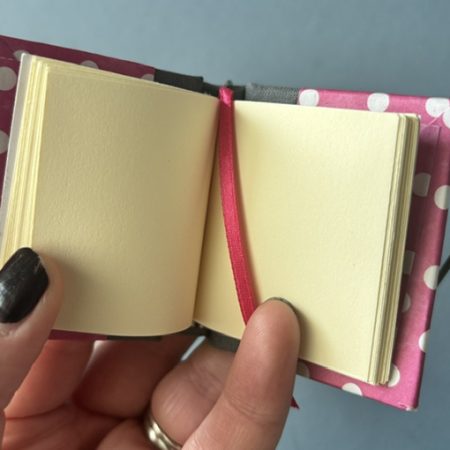Handmade Notebook Keyring | 48 pages | Grey spine with pink cover and white polka dots | Ribbon page marker