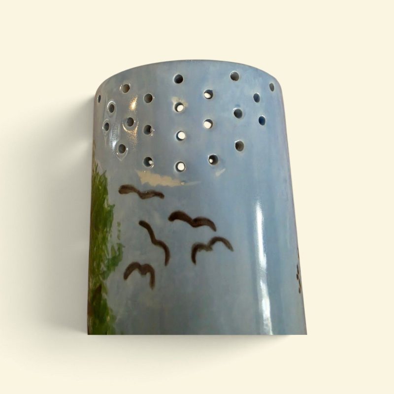 Hand painted ceramic watering can.