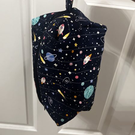 Handmade quilted space toiletry and makeup bag