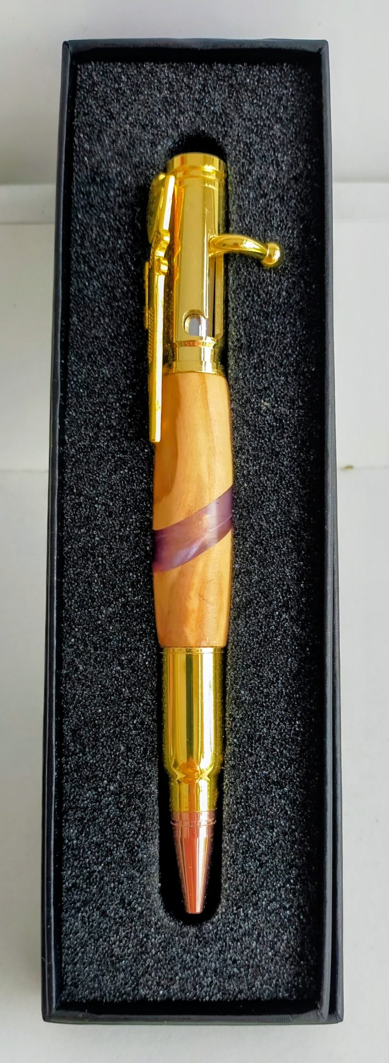 FULL SIZE OLIVE WOOD BOLT ACTION PEN. Handmade features Bolt action & rifle clip with chrome and copper finish.