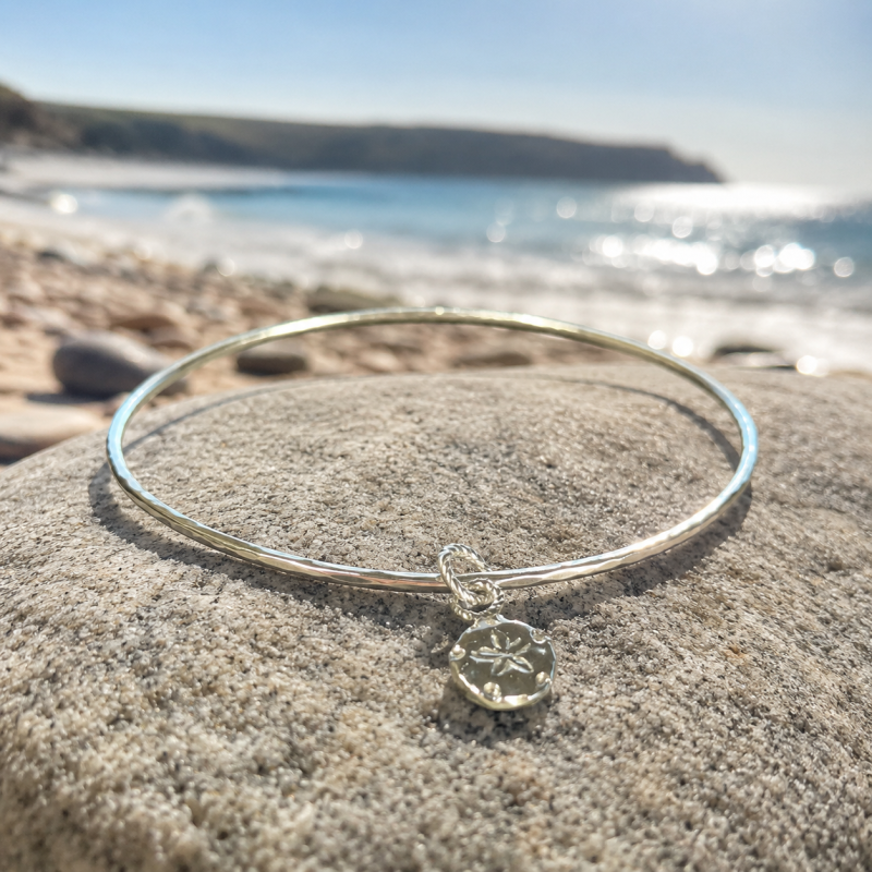 Coastal Sterling Silver Sand Dollar Charm Bangle