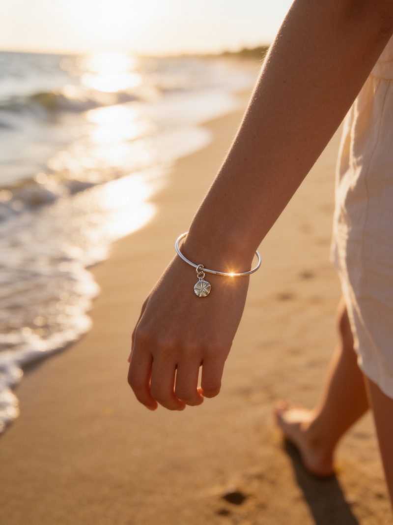 Coastal Sterling Silver Sand Dollar Charm Bangle