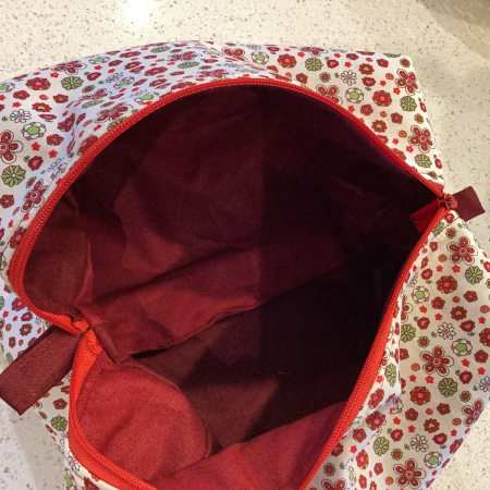 Pretty Red/White/Green Floral Fabric, Red Zipped, Toiletry/Cosmetic/Make Up Bag with two tone Burgundy Lining