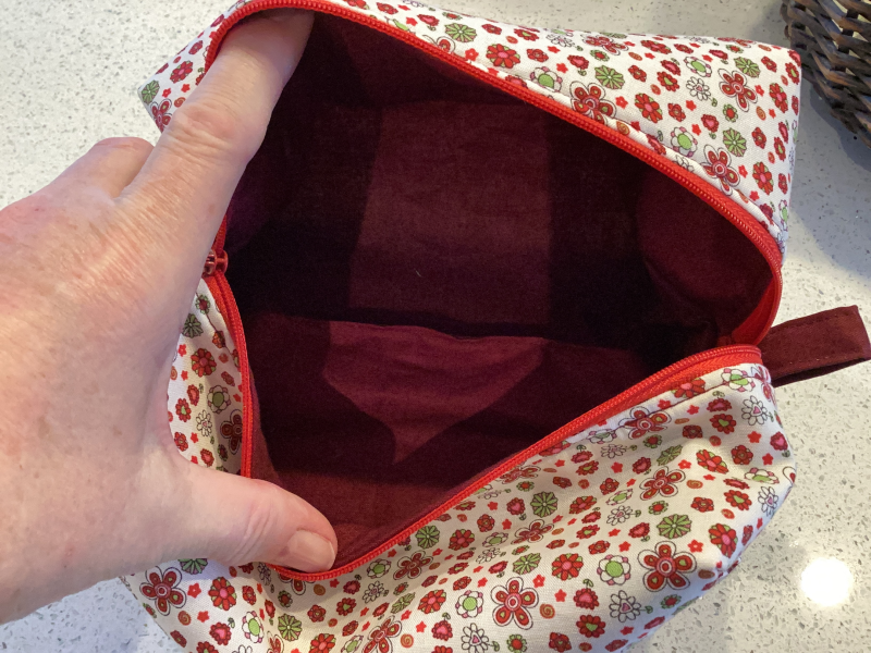 Pretty Red/White/Green Floral Fabric, Red Zipped, Toiletry/Cosmetic/Make Up Bag with two tone Burgundy Lining