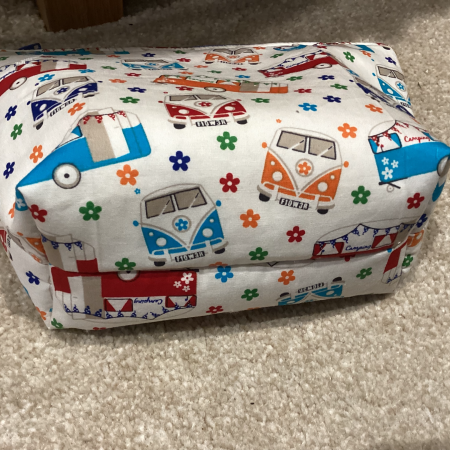 Small/Medium White Multicoloured Campervan Print Fabric Zipped Lined Make Up Bag/Pouch Why not brighten up your holiday essentials with this gorgeous White Multicoloured Campervan Print Fabric Zipped Lined Make Up Bag/Pouch.