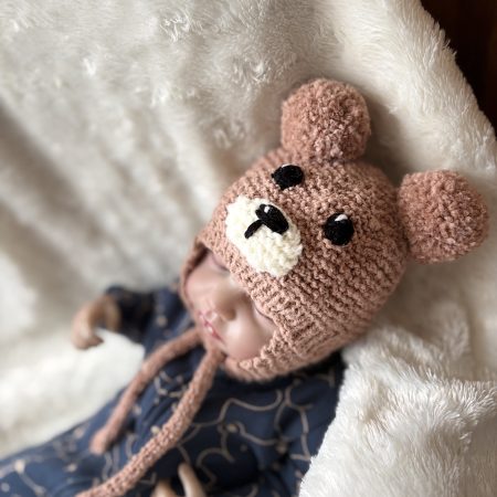 Hand knitted beige baby bear, trapper style hat with chin ties. Available in 3 sizes