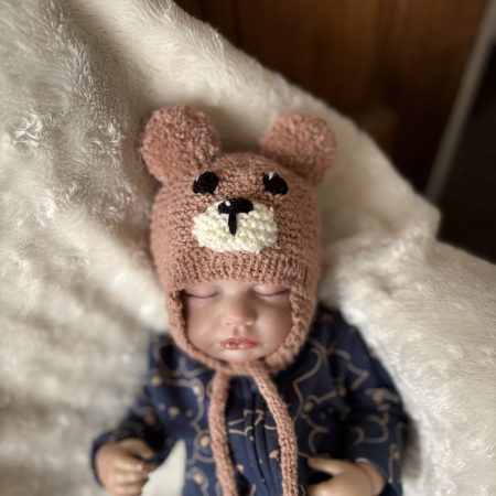 Hand knitted beige baby bear, trapper style hat with chin ties. Available in 3 sizes