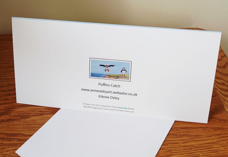 Greetings Card Featuring Puffins on a Cliff, Blank Inside 21cm x 10cm
