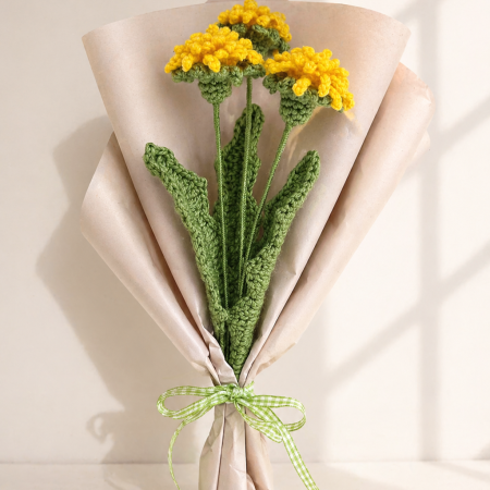 Handmade crochet dandelion bouquet with three yellow flowers inspired by nature