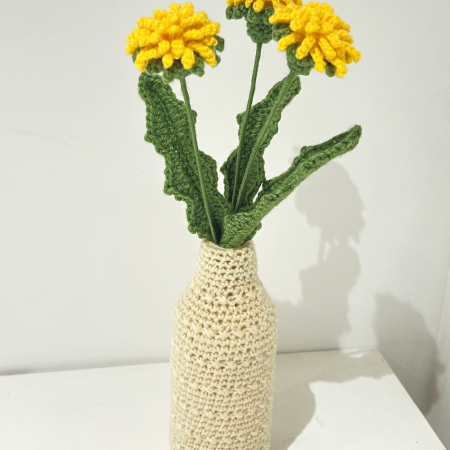 Crochet dandelion bouquet displayed as everlasting floral home decor