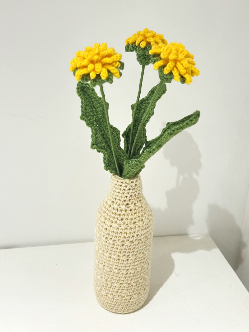 Crochet dandelion bouquet displayed as everlasting floral home decor