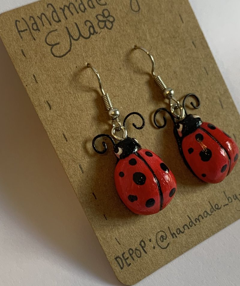 Hand-sculpted and painted red spotted ladybird earrings with stainless steel hooks