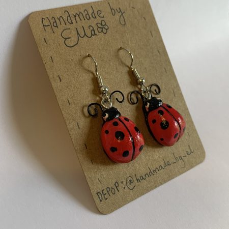 Hand-sculpted and painted red spotted ladybird earrings with stainless steel hooks